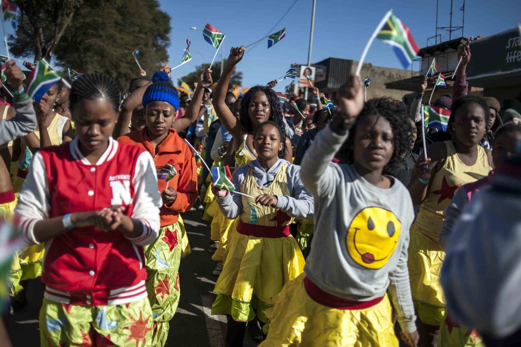 Youths march through the streets of Soweto to commemorate youth day. (Ihsaan Haffejee)
