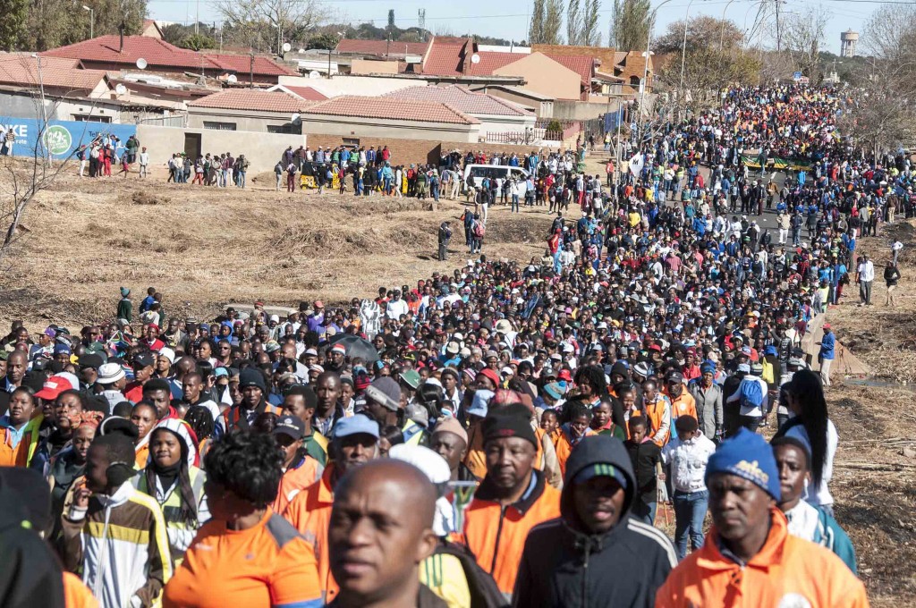 Hundreds of people made their way through Soweto during a commemorative march on Youth Day. (Ihsaan Haffejee)