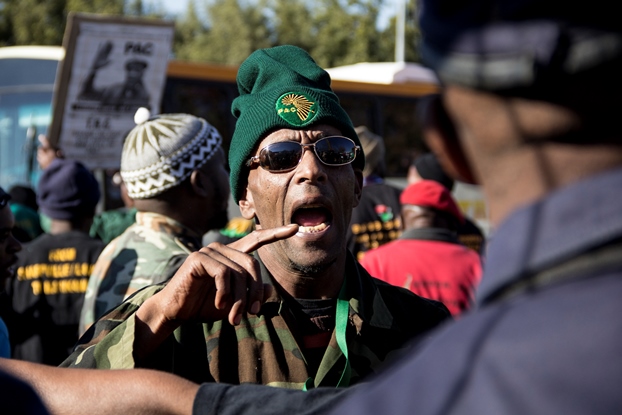 Johannesburg, South Africa: Pan African Congress (PAC) members argue with Policemen over entry to the Hector Pieterson Memorial site on June 16 2016.