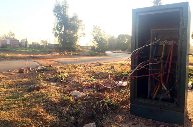 Residents from Thembelihle connect power illegally from an electricity box