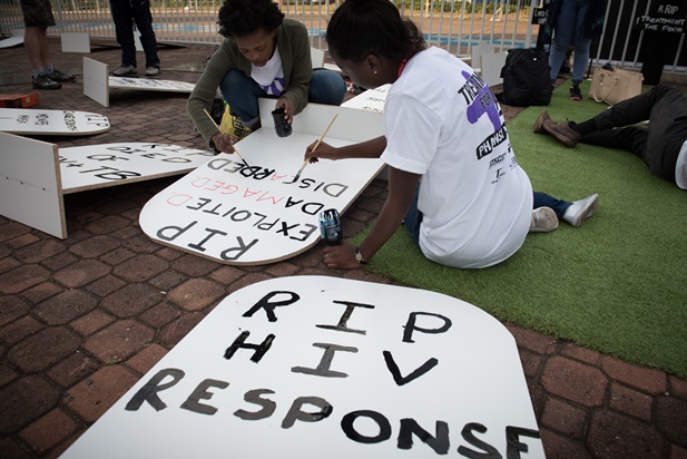 Activists in the Global Village prepare for a demonstration. Photo Â©International AIDS Society/Marcus Rose