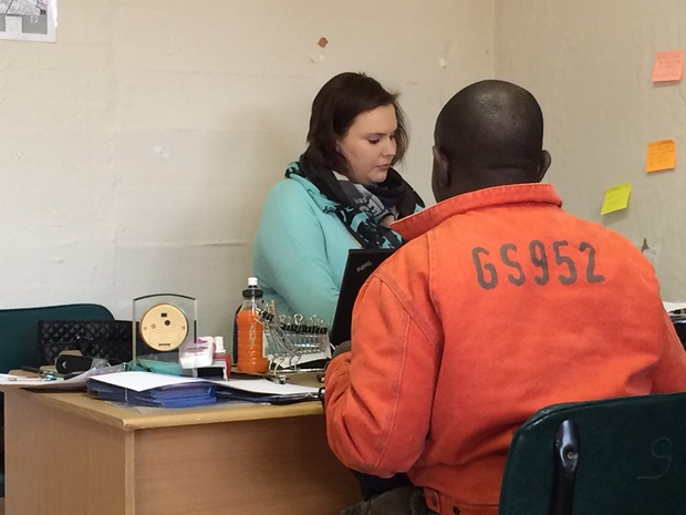 DA councillor Nicole Graham assisiting a community member with a proof of address letter 