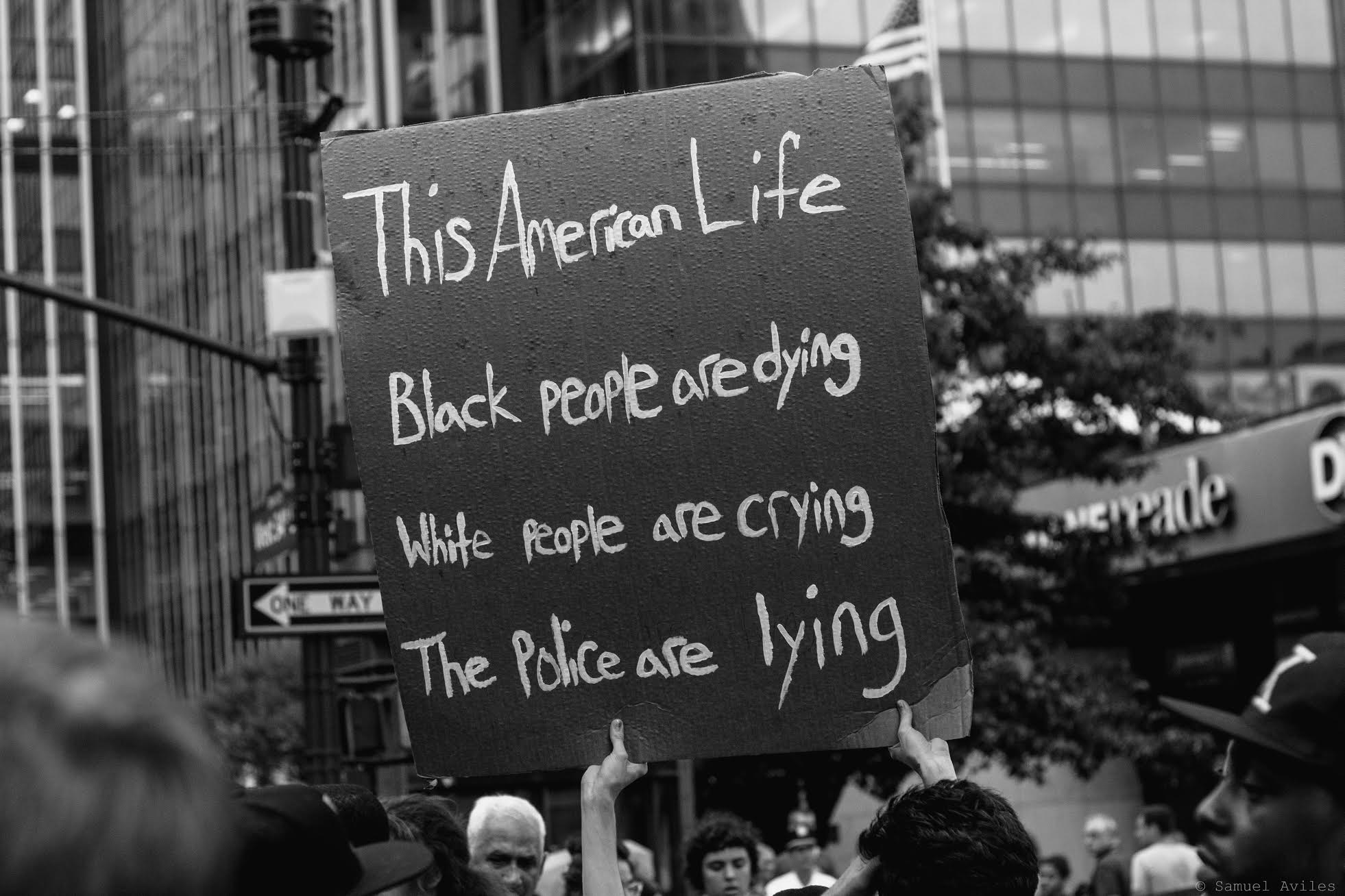 Sign at the July 7th protest against police brutality in Manhattan, New York. The sign references the innocent black people killed by police.