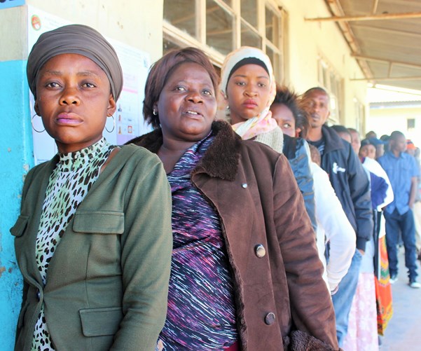  Women with voices: female voters queue up in their own line to cast their ballots at Chawama Primary School in south western Lusaka. Chawama is a consituency held by President Lungu and it was also the area where inter-party clashes led to campaigns being suspended for 10 days in June and July.