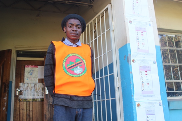 On the lookout: A first-time polling agent gave up his right to vote so others could do so at Vera Chiluba Secondary School in Mtendere, eastern Lusaka