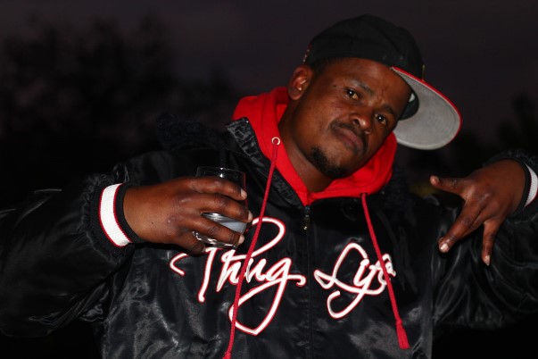 Former member of the Mongrels gang and aspiring rapper, Gordon, wearing a jacket glorifying Shakurâ€™s â€˜thugâ€™ lifestyle. Shakur is Gordonâ€™s most important musical influence. Two years ago, Gordon left gang life through Hanover Parkâ€™s Ceasefire project. The project employs ex-gangsters to mediate gang disputes and to encourage and support gang members to leave and stay out of gangs.
