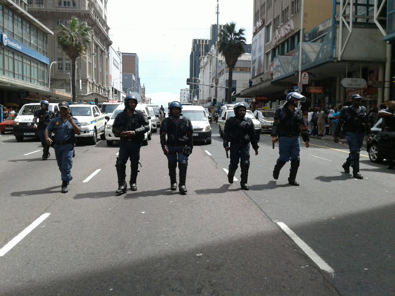 Police escorting students to City Hall. #KZNFMF